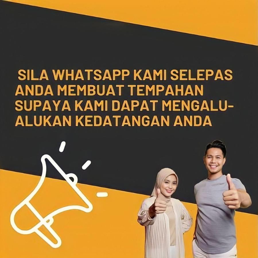 Sinar Rasa Homestay At I-Soho, I-City Shah Alam Exterior foto A poster from the National Security Council of Malaysia, asking people to stop spreading fake news via WhatsApp.
